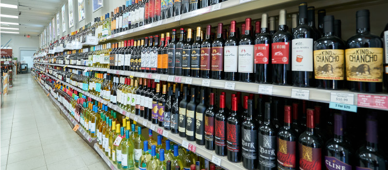 long wall of wine bottles